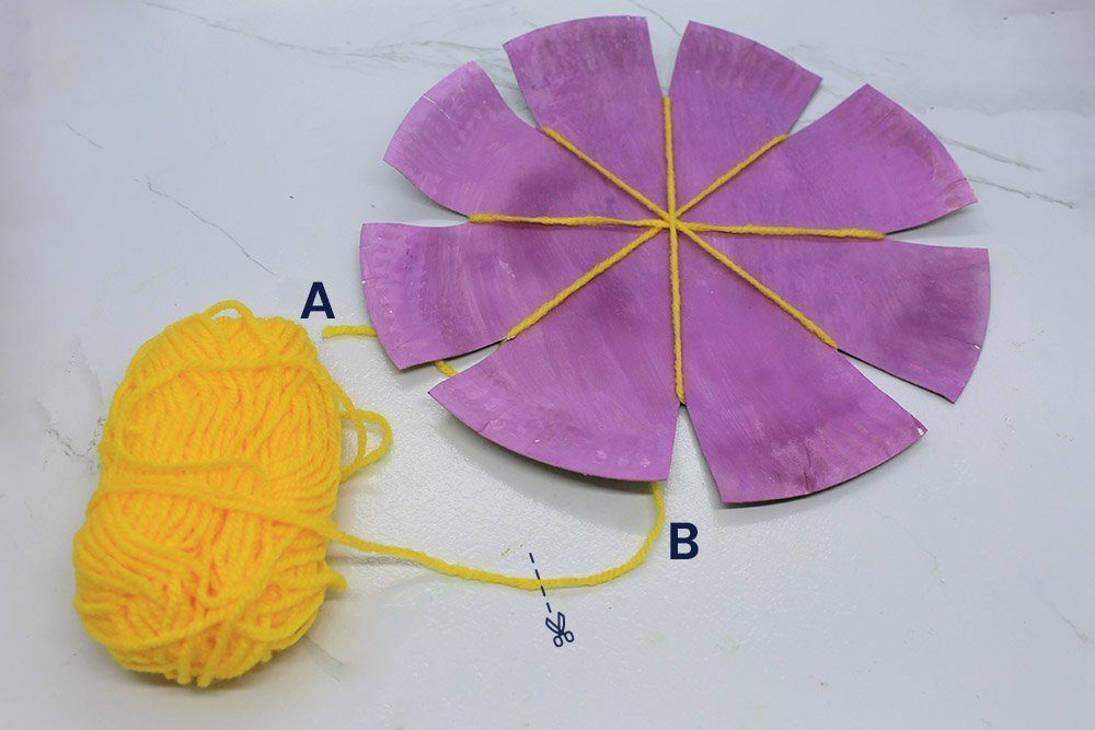 How to Make a Paper Plate Weave - Step 7